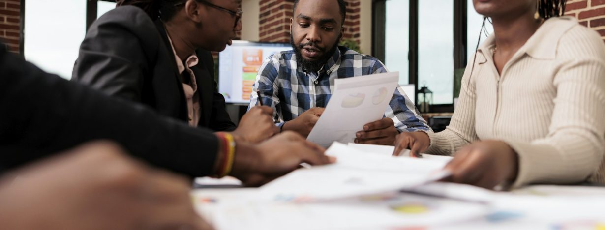 African american people doing teamwork in office